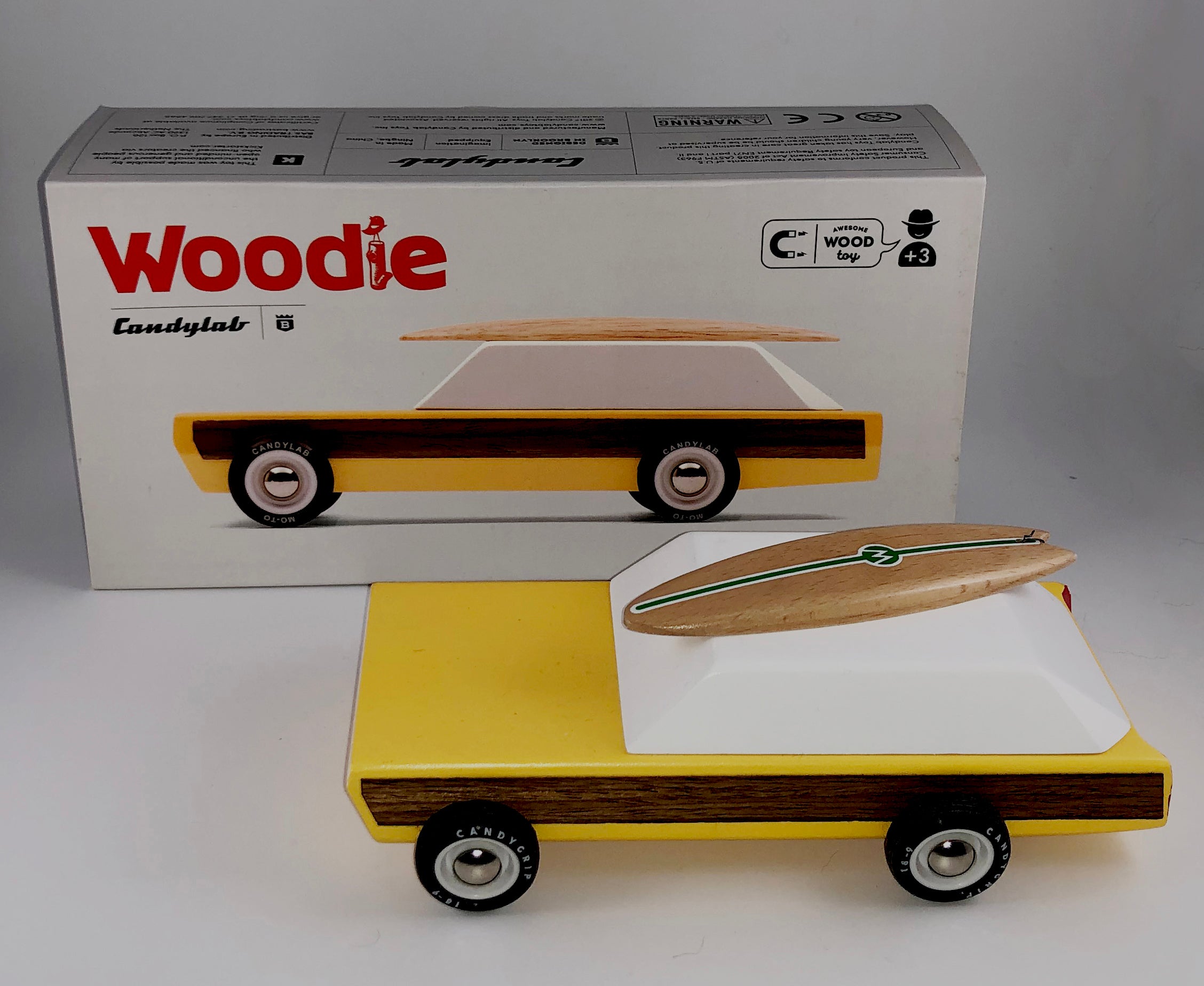 A cultural icon in its own right, this woodie has real veneer side panels and magnetic attachments. A tow hitch and a surfboard roof "rack".